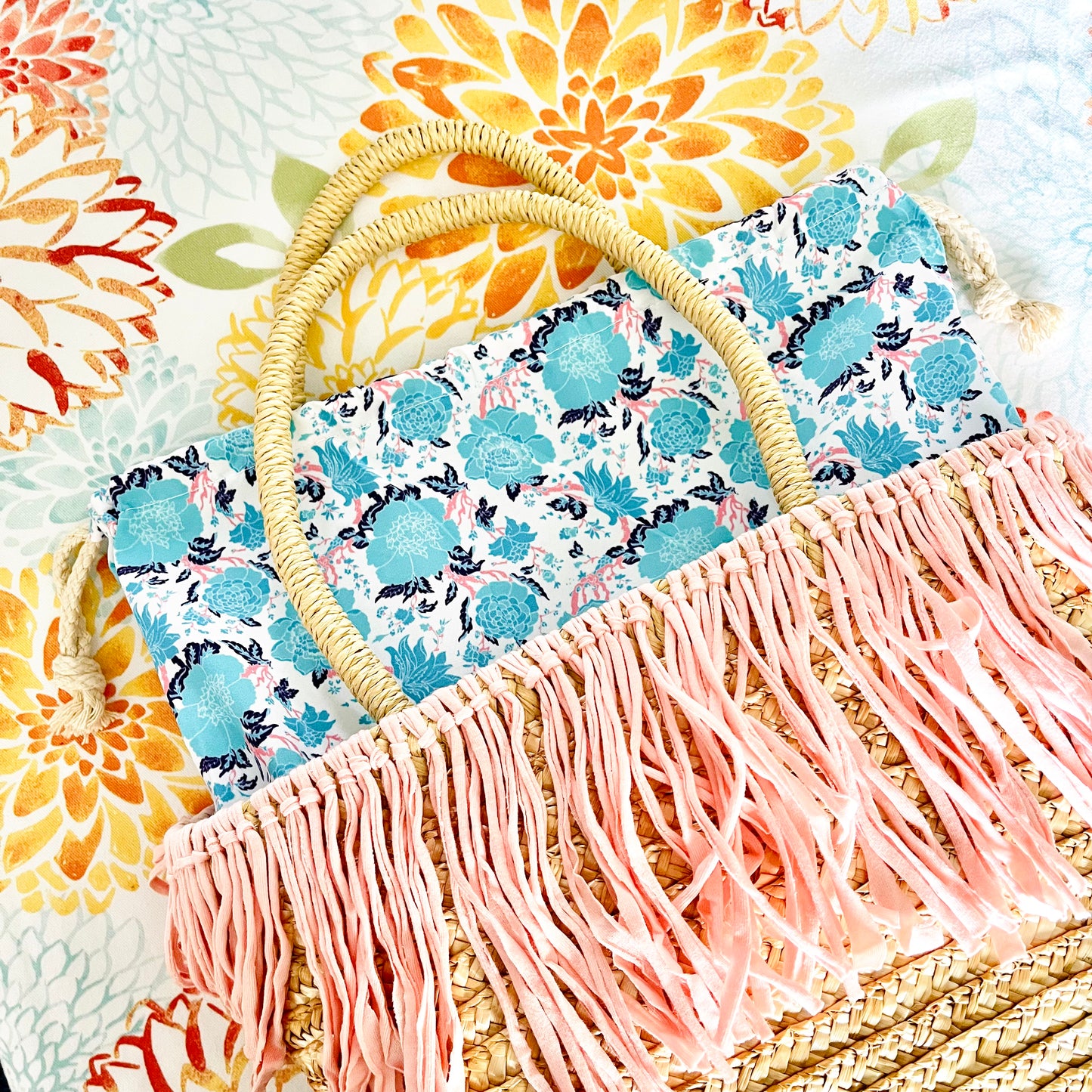Maya Pink Fringe Cinch Top Straw Bag
