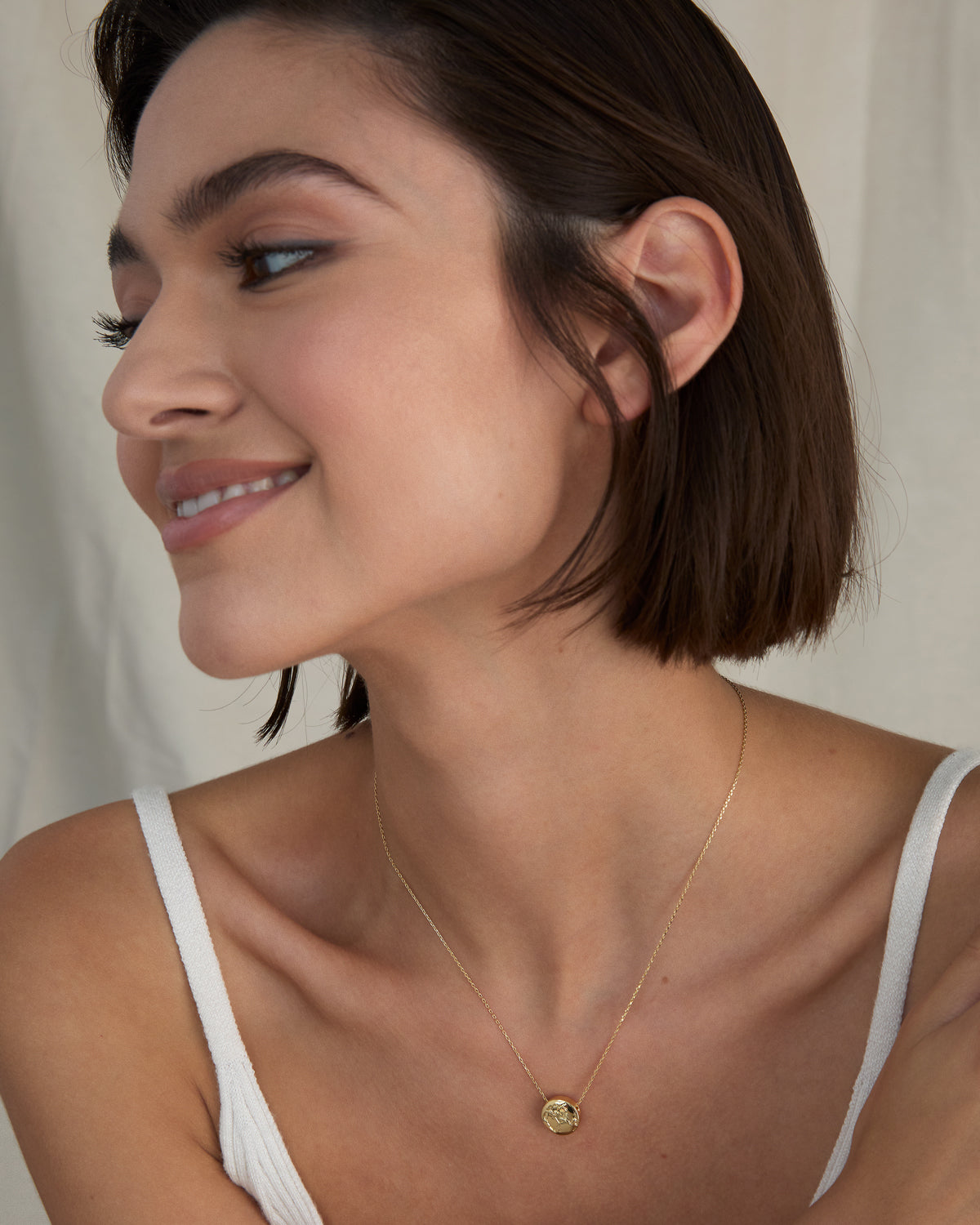 Us Against The World Icon Necklace