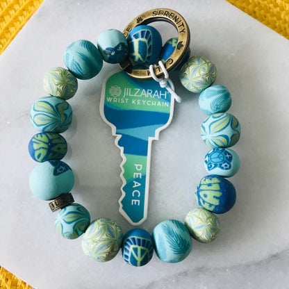 Happy Vibes Wrist Keychain (Peace)